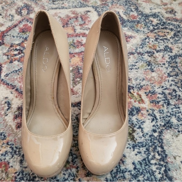 Aldo Shoes - Nude platform heels. size 6